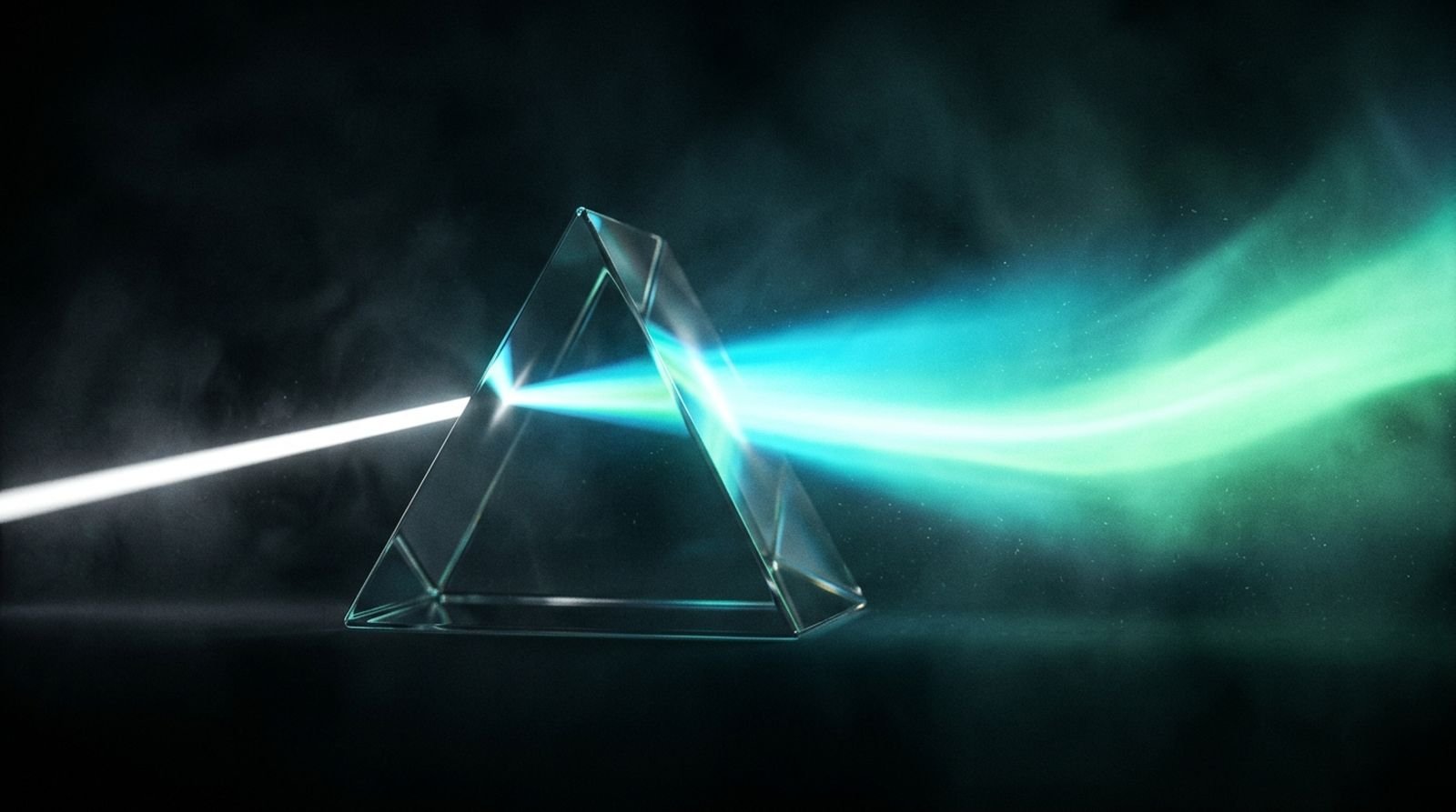 A beam of white light refracting through a prism into a cyan and green spectrum